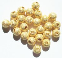 25 6mm Round Gold Metal Stardust Beads